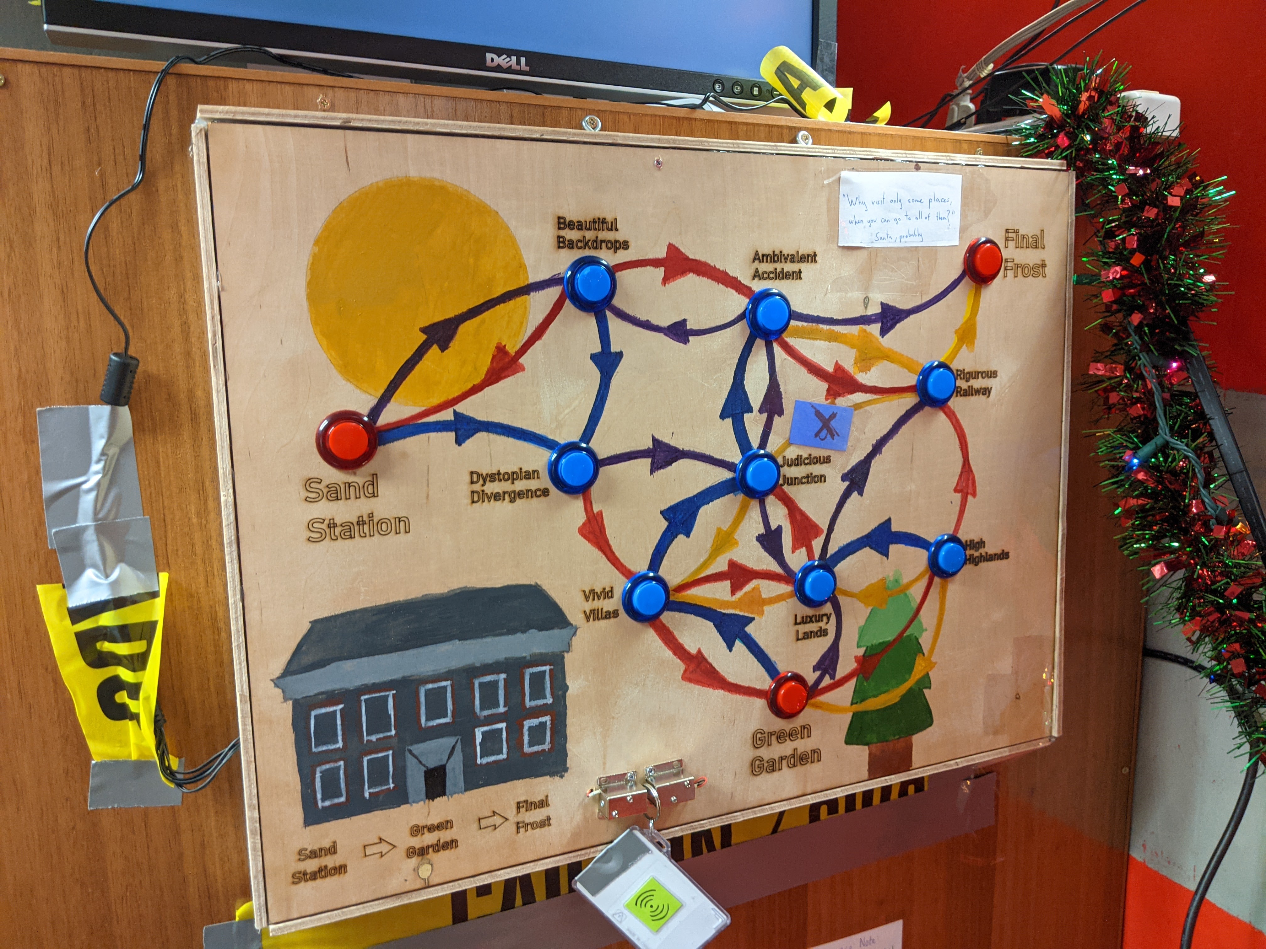 A wooden map puzzle with light-up electronic buttons